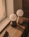 Okeni table lamp made of walnut veneer and glass