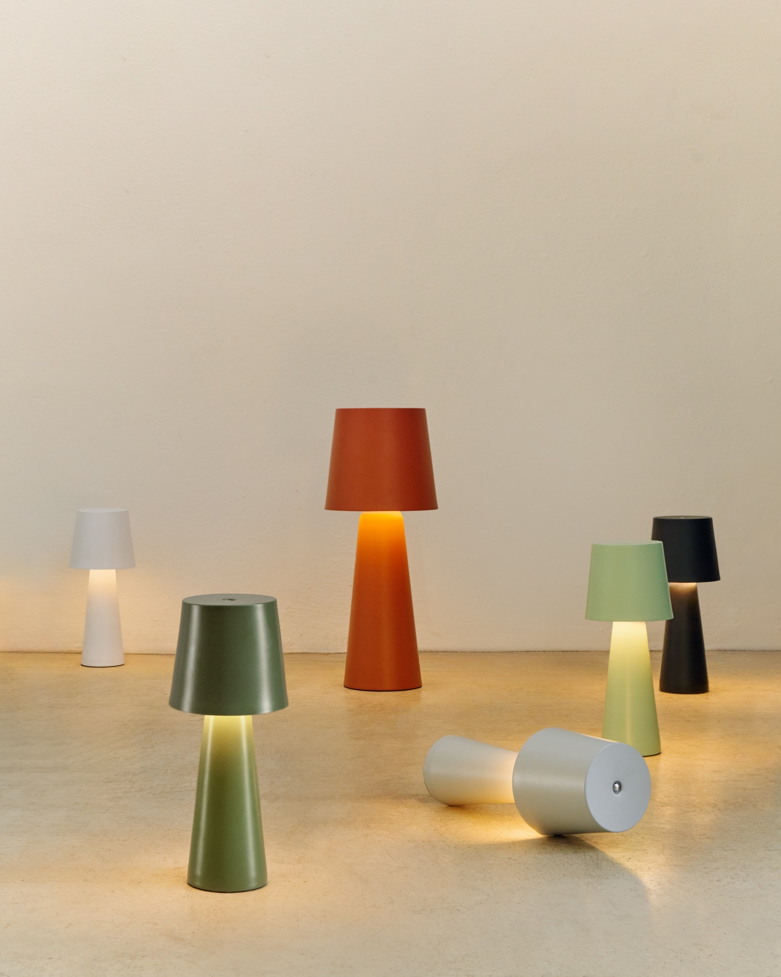 Arenys small outdoor metal table lamp in a grey painted finish