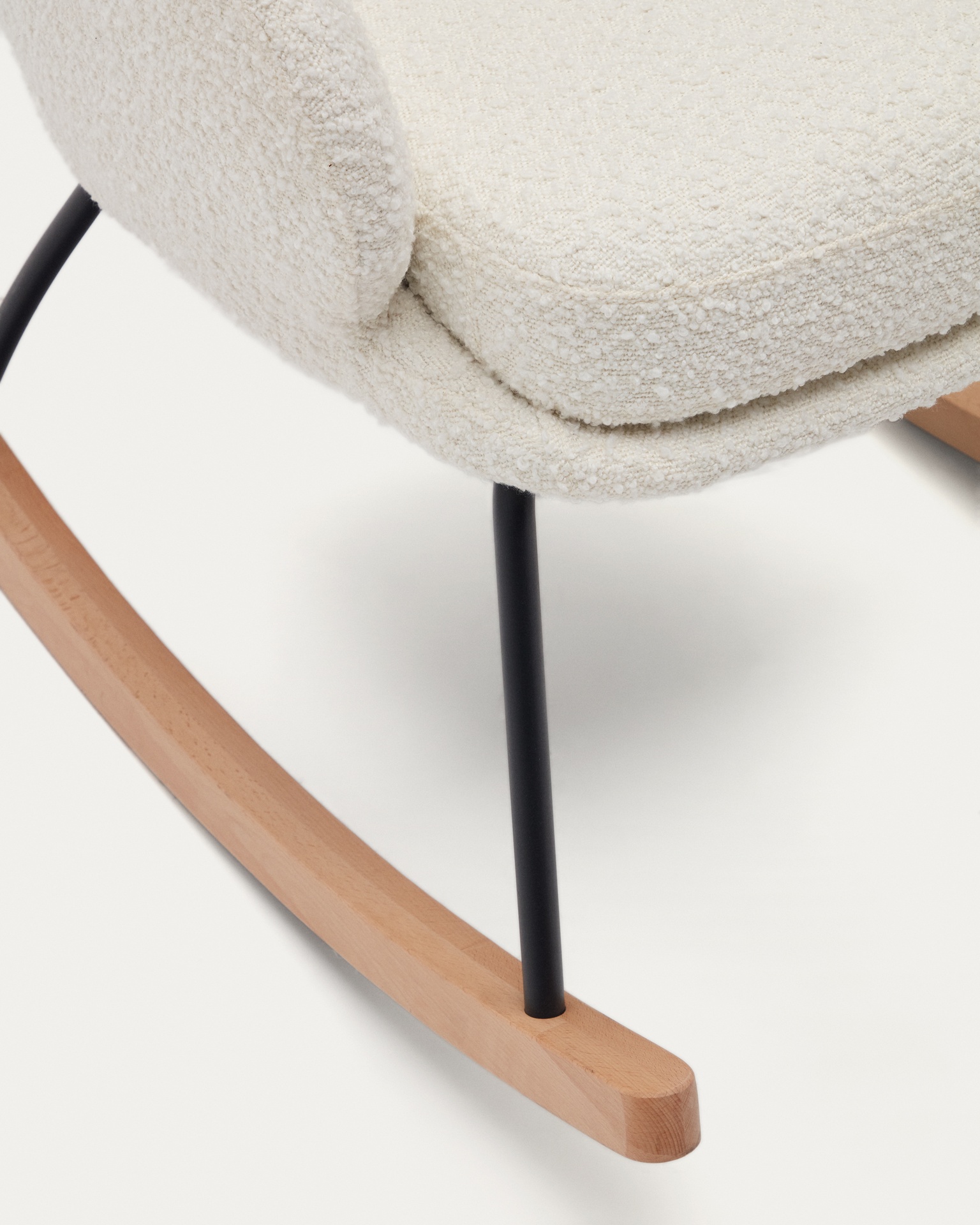 Maustin rocking chair in white bouclé with a black steel structure and beech wood