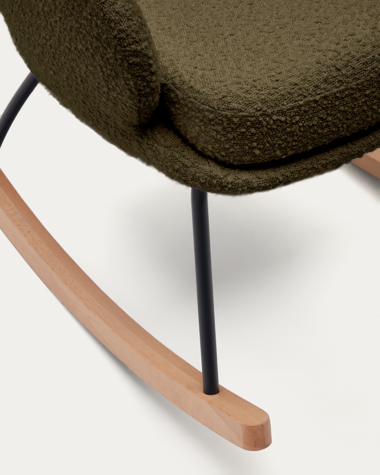 Maustin rocking chair in green bouclé with a dark green steel structure and beech wood