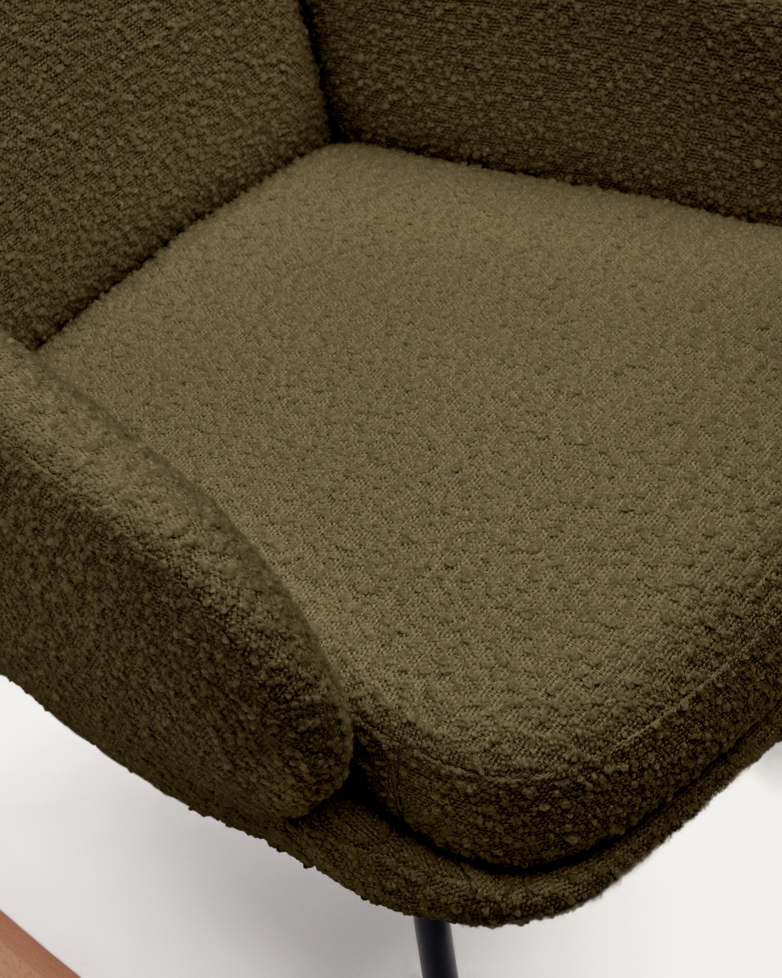 Maustin rocking chair in green bouclé with a dark green steel structure and beech wood