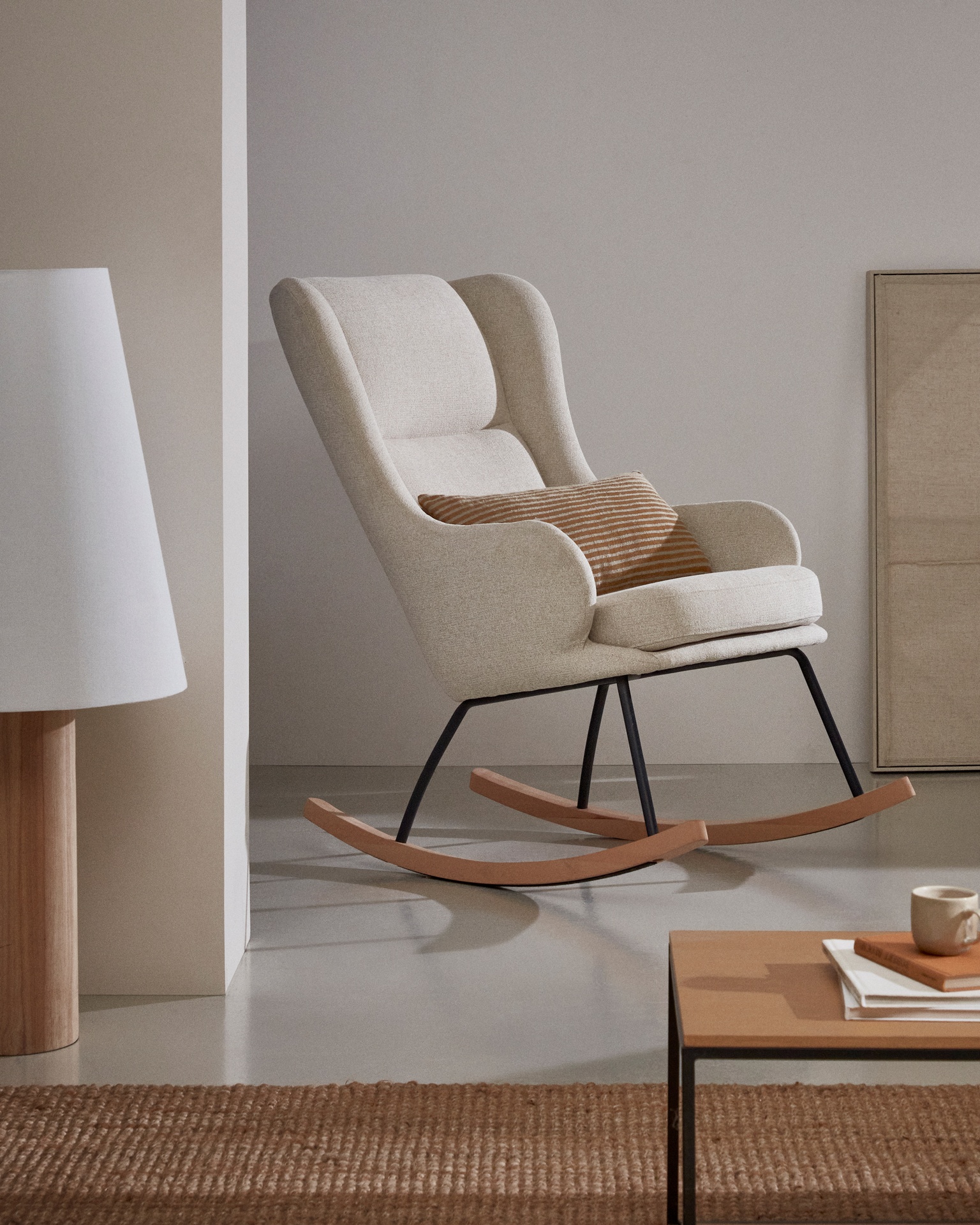 Maustin rocking chair in beige chenille with a black steel structure and beech wood 