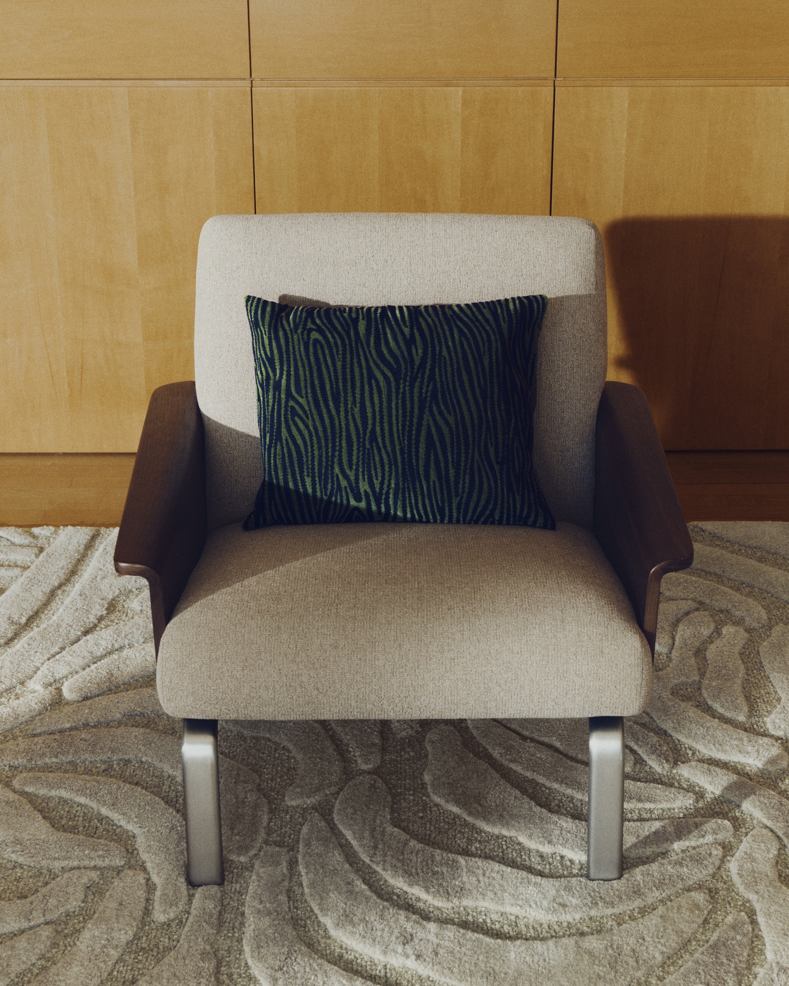 Amsen light brown armchair in walnut plywood with legs in brushed stainless steel FSC 100%