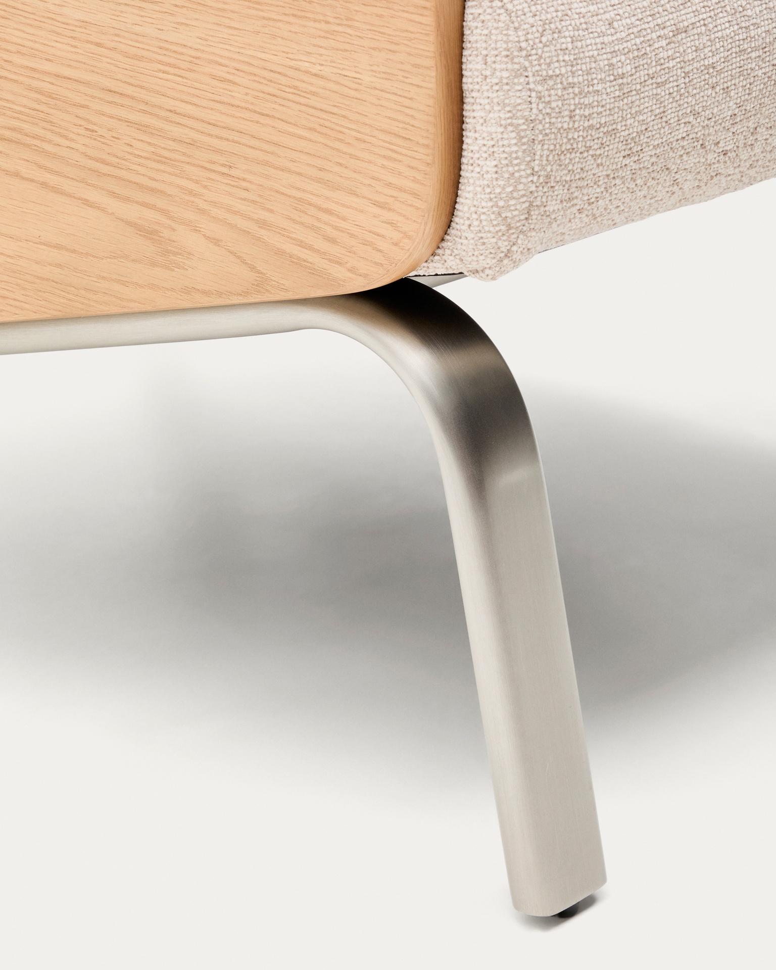 Amsen beige armchair in oak plywood with legs in brushed stainless steel FSC 100%