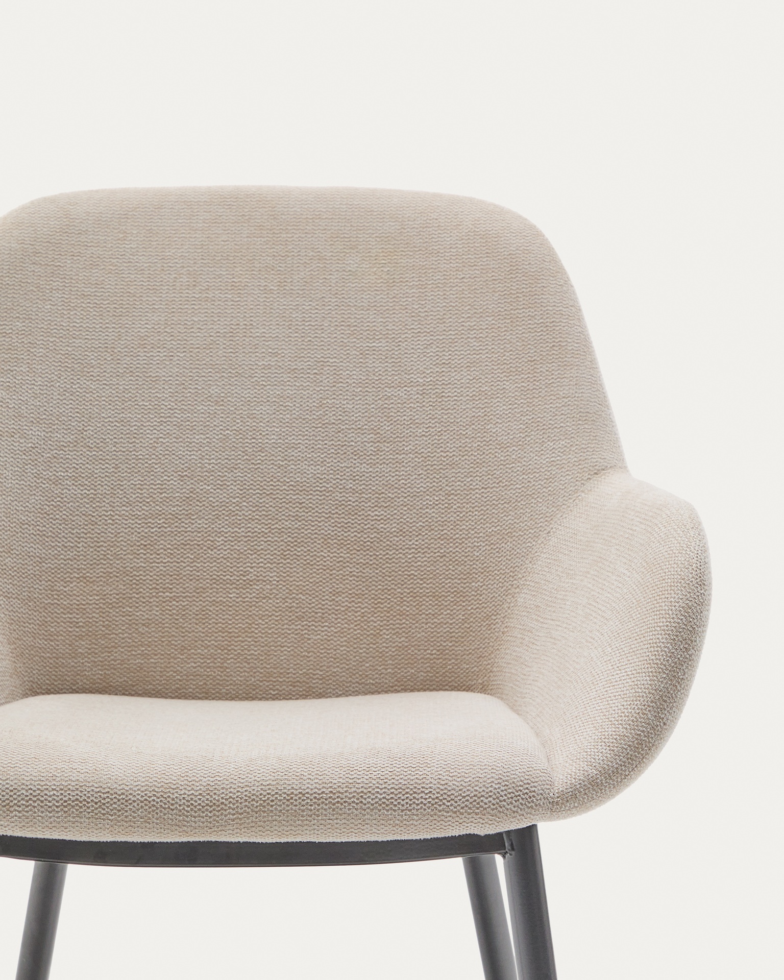 Konna chair in beige and steel legs in a painted black finish