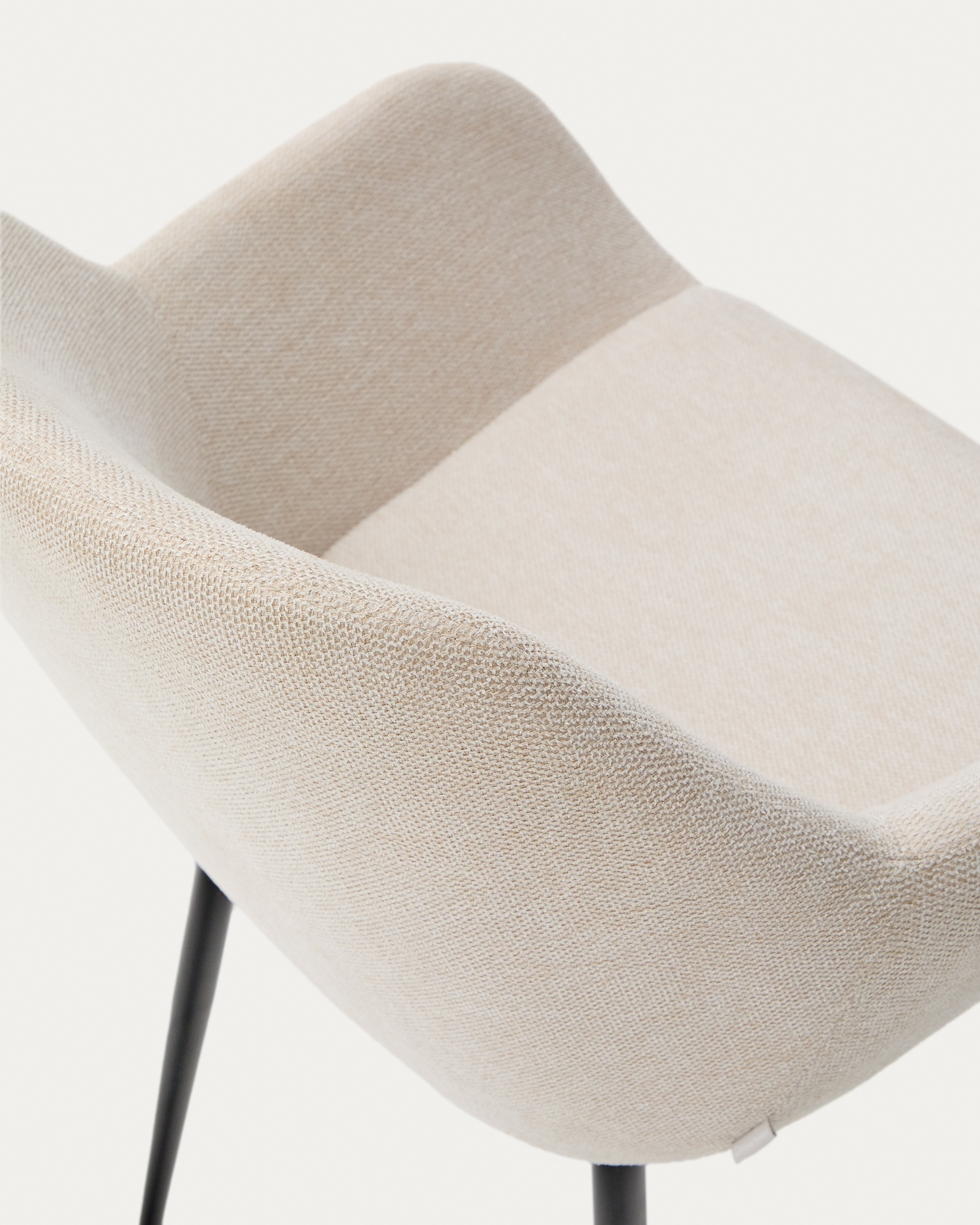 Konna chair in beige and steel legs in a painted black finish