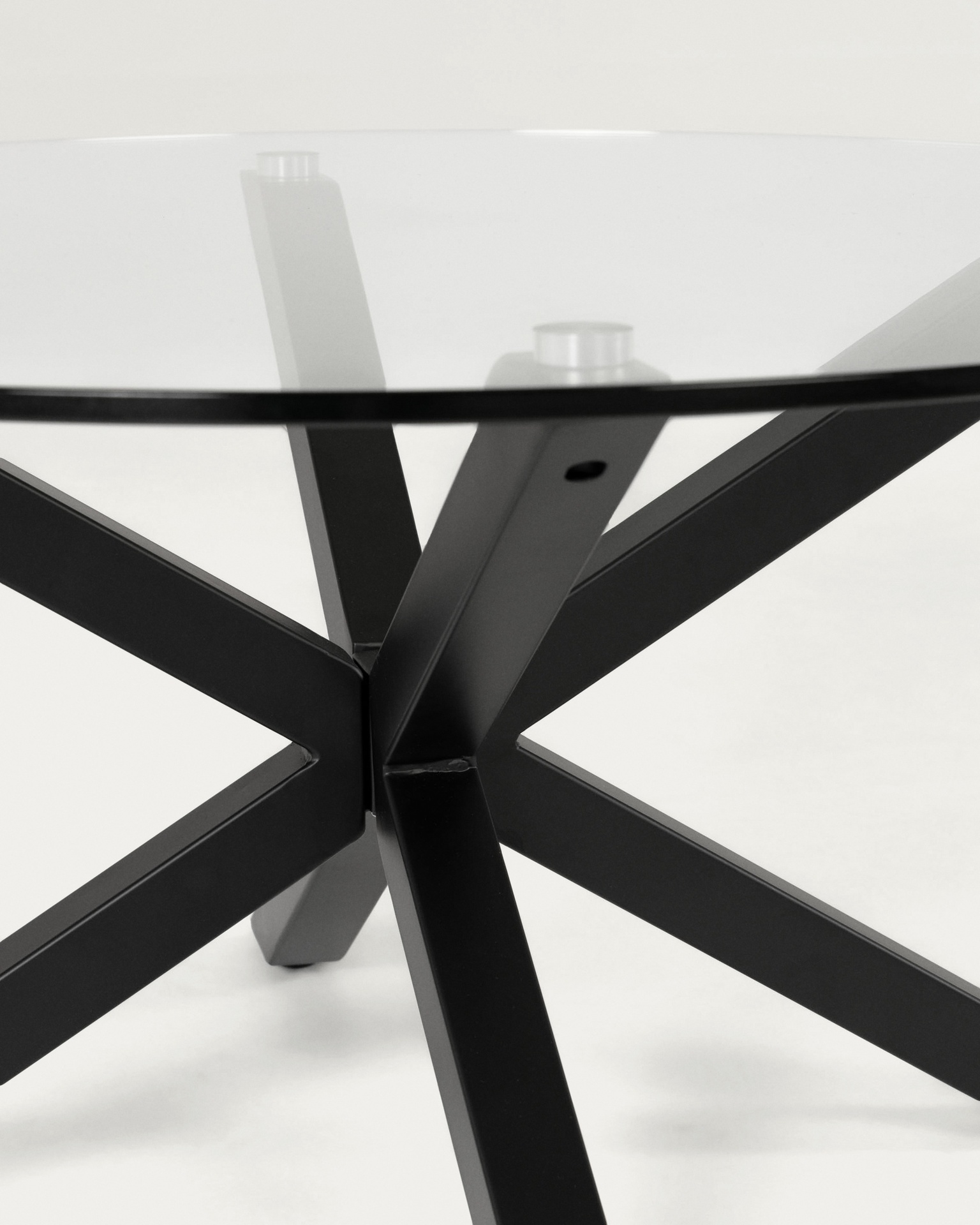 Argo round glass table with steel legs with black finish Ø 119 cm