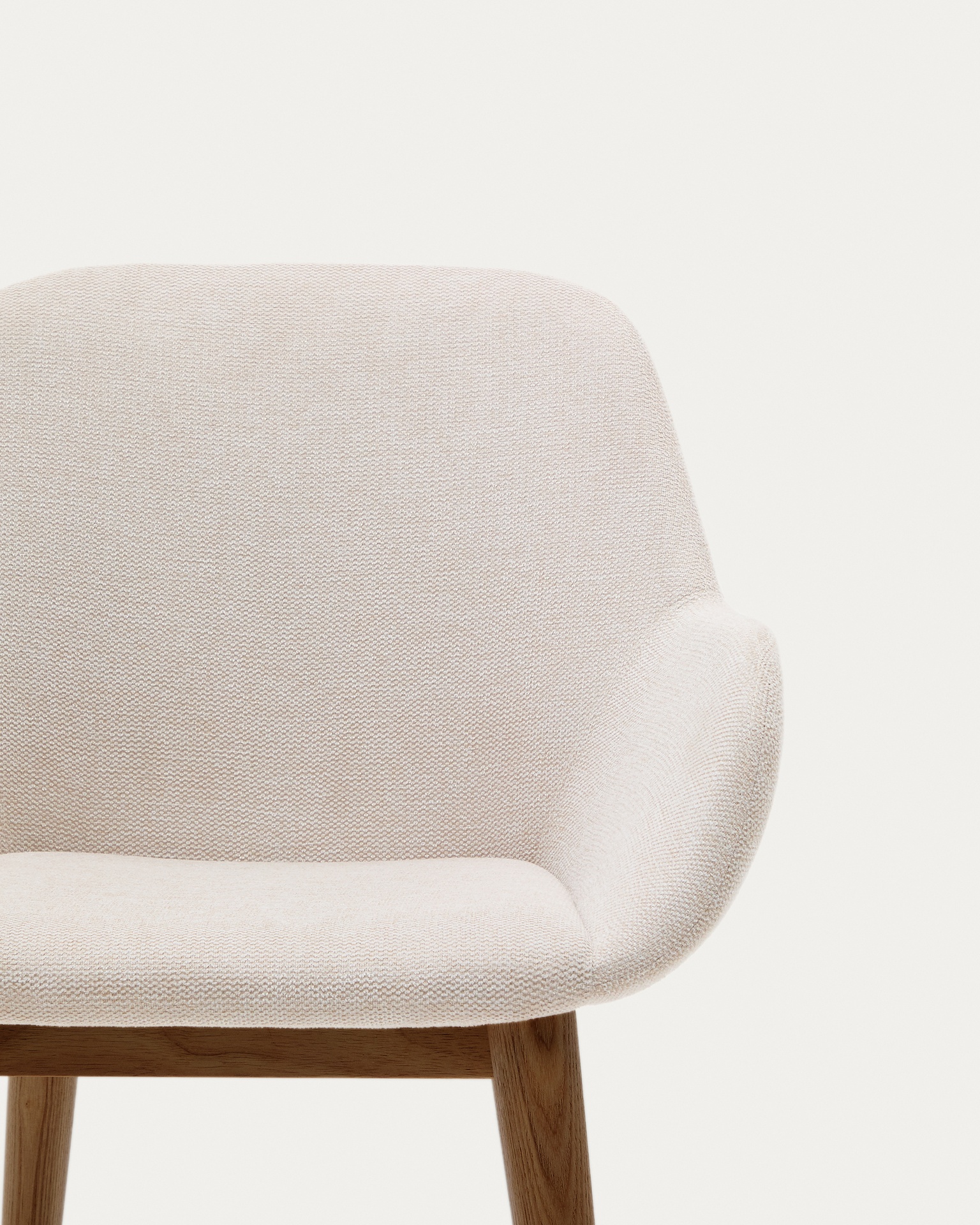 Konna chair in beige with solid ash wood legs in a dark finish
