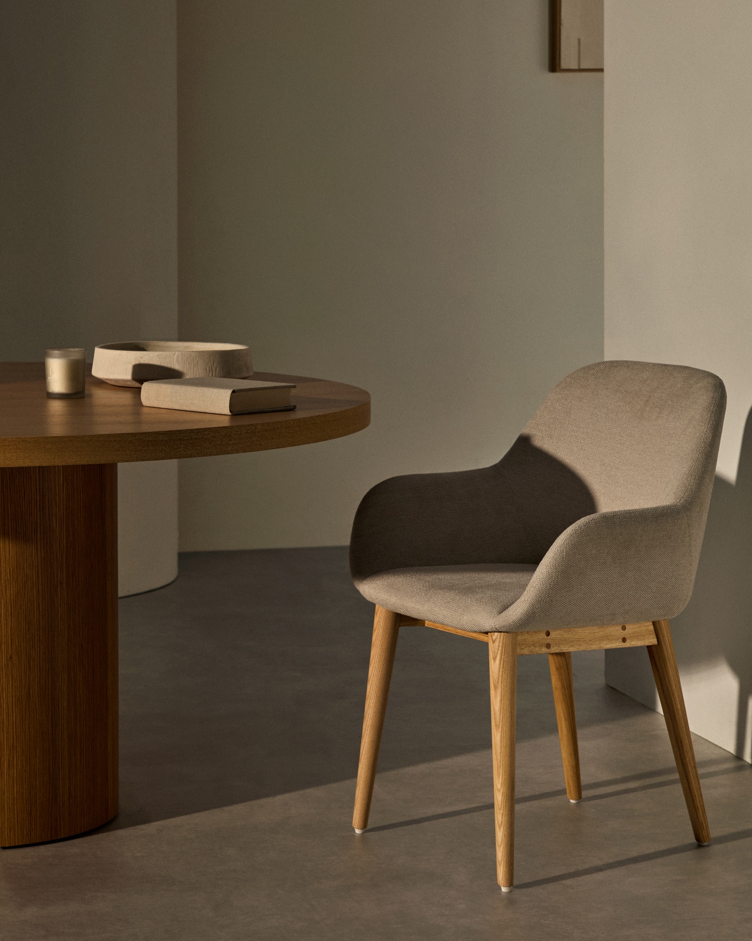 Konna chair in beige with solid ash wood legs in a natural finish