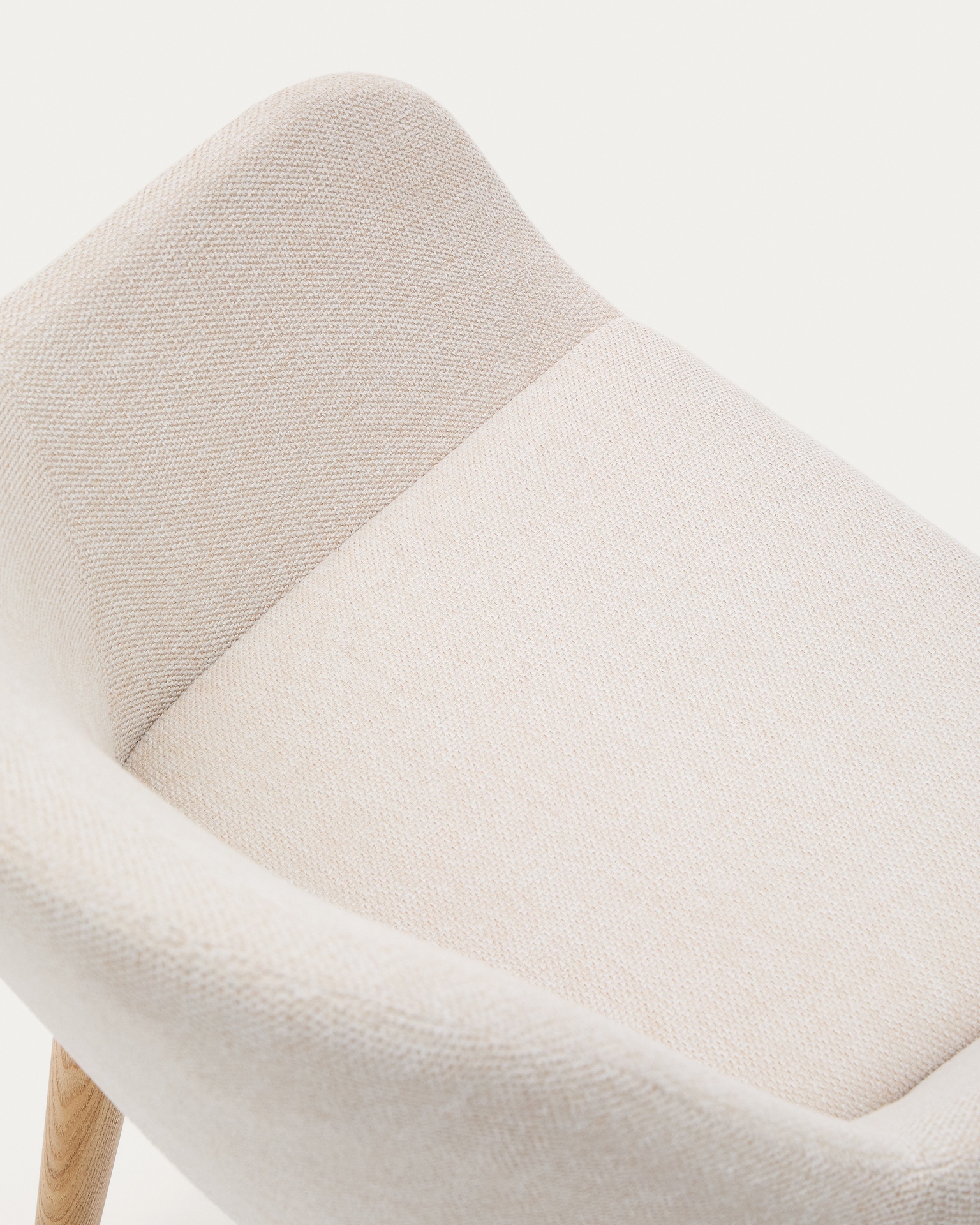 Konna chair in beige with solid ash wood legs in a natural finish