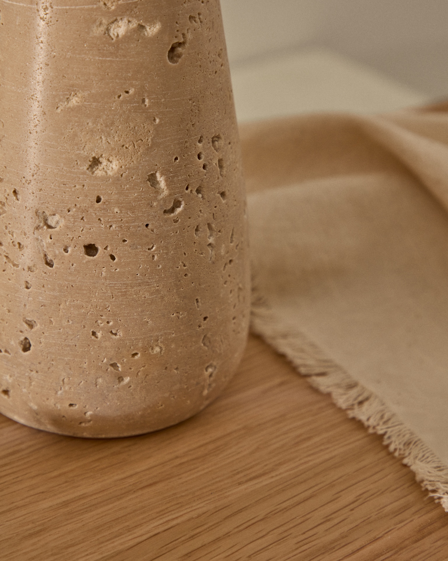 Magan small beige travertine candle holder